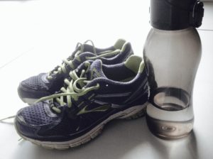 learn how to persevere, running shoes and water bottle