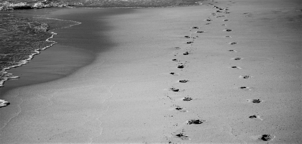 footprints on beach - where are you god